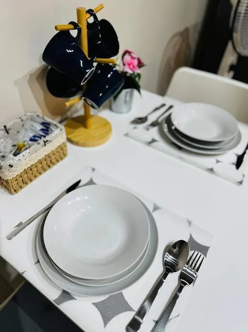Apartment 10G Cozy Condo At Park Mckinley West Near Venice Mall Manila Philippines