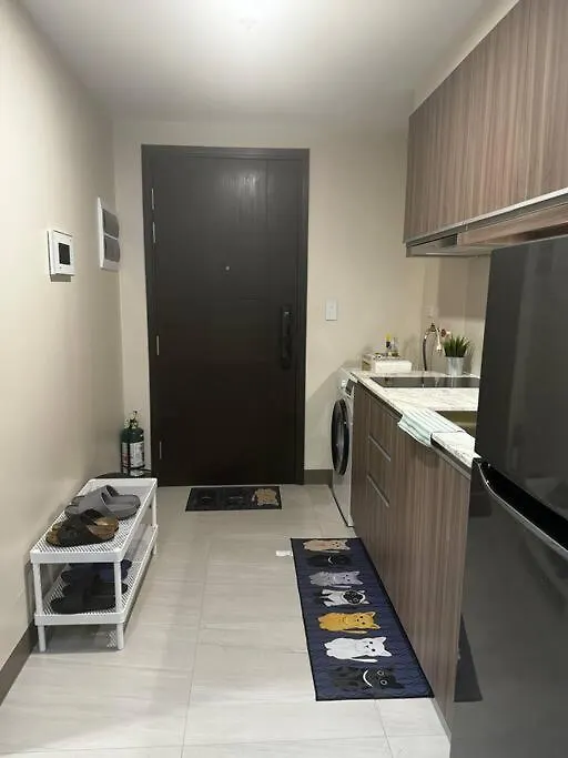 10G Cozy Condo At Park Mckinley West Near Venice Mall Manila Apartment