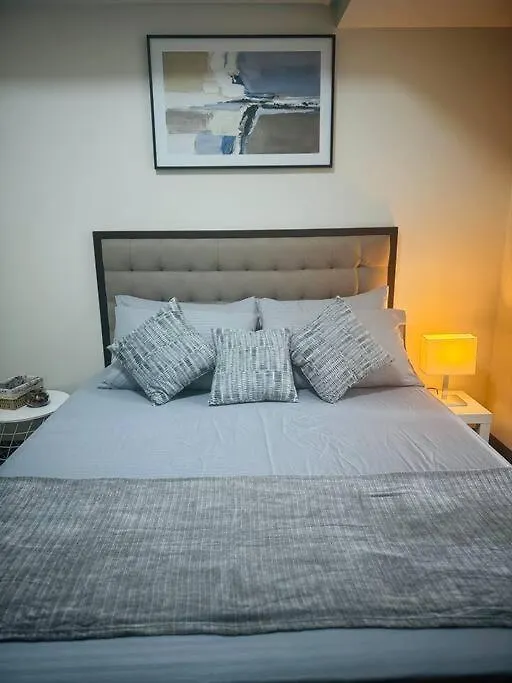 10G Cozy Condo At Park Mckinley West Near Venice Mall Manila Apartment