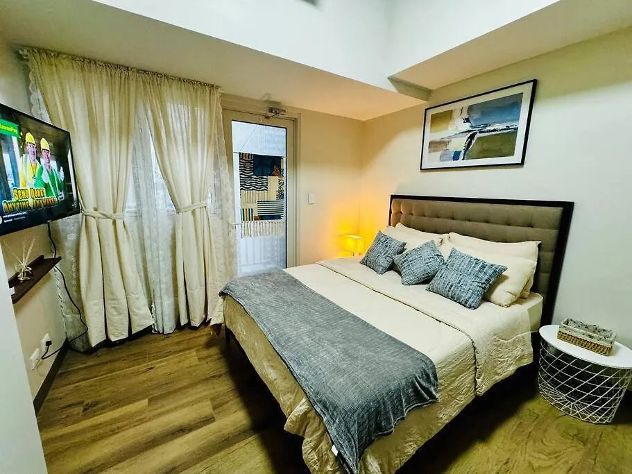 Apartment 10G Cozy Condo At Park Mckinley West Near Venice Mall Manila Philippines